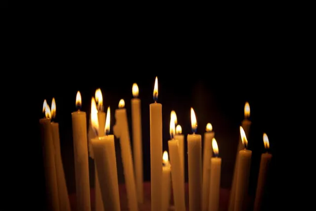 Candles glowing in the dark